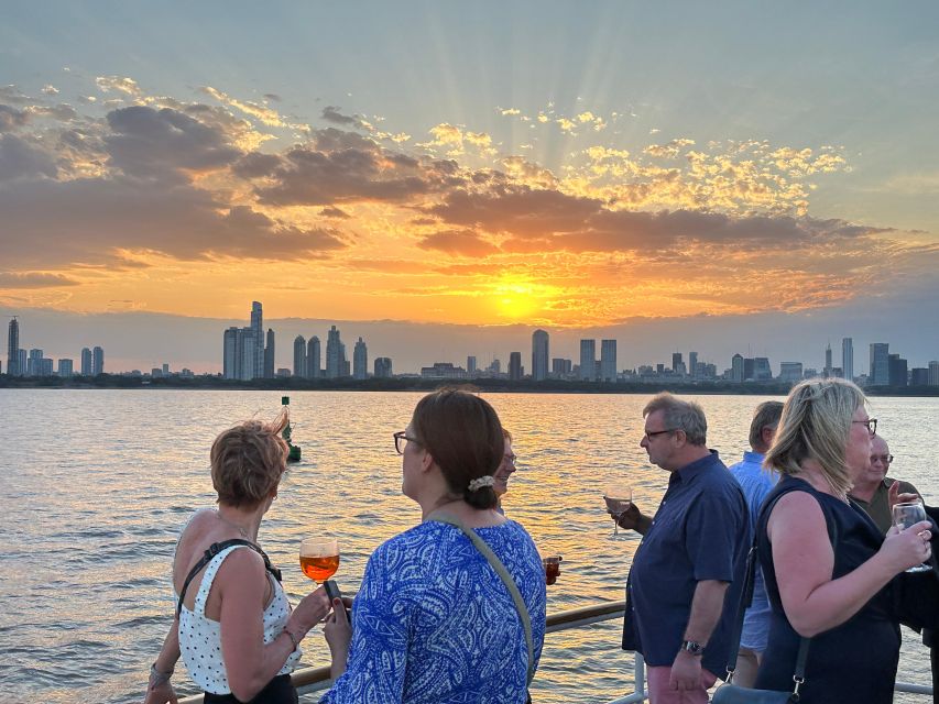 Buenos Aires: Puerto Madero Sunset Cruise with Open Bar - Your one-hour sail: Immigration Museum, yacht club views, and port details
