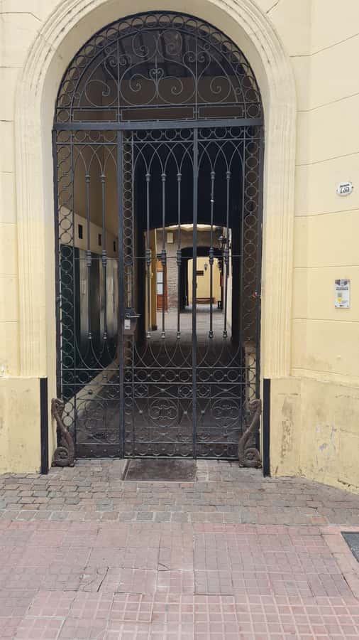 Buenos Aires: San Telmo, History, Bars, and Tango! - Comic-strip street details, the narrowest house, and the catacombs entrance