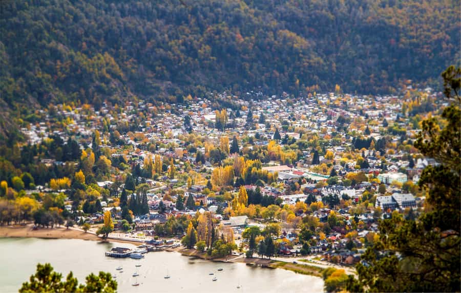 From Bariloche: San Martin de los Andes and 7 Lakes Circuit - Lake Machonico: Calm Dark Blue Water Between Mountains