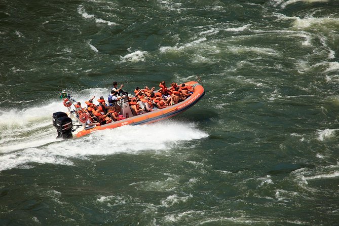 Iguazu Falls: FWD in the Jungle, Boat Ride and Argentinian Falls - The falls walk: lower trail mist, big stairs, and that upper footbridge view