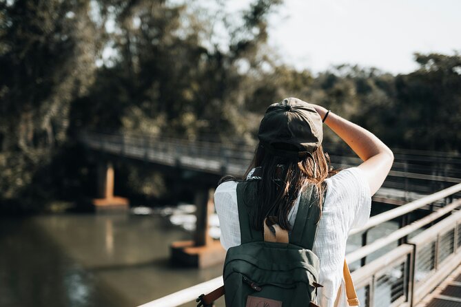 Immersive Iguazú Falls In One Day: Guided Walk, Train Ride & Boat - Getting from Puerto Iguazú to the park, and why that first drive matters