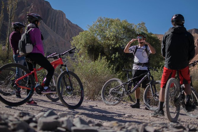 Mountain biking in the surroundings of Tilcara - The Rural Turn: Multicolored Hills, Houses, and Gravel Road Life
