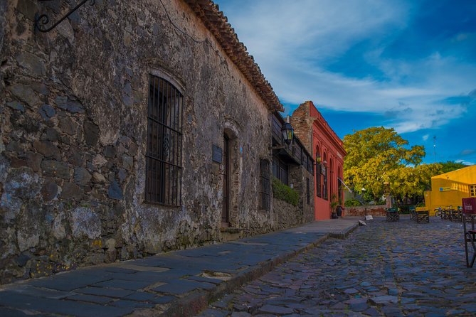 Premium Day Trip to Colonia del Sacramento - La Calle de los Suspiros: narrow street, drainage channel, and real period details