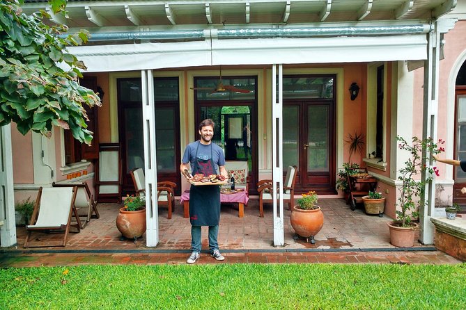 Private Asado Cooking Class in a Beautiful Home with Transfers - Breaking down the asado: quebracho fire, meat cuts, and grilling technique
