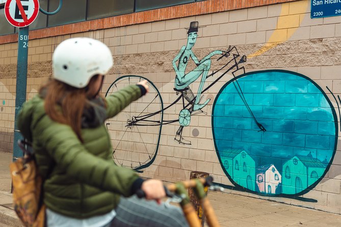 Private Off the Beaten Path: Hidden Urban Art Bike Tour - The ride south to La Boca, murals, and what “working neighborhood” really means