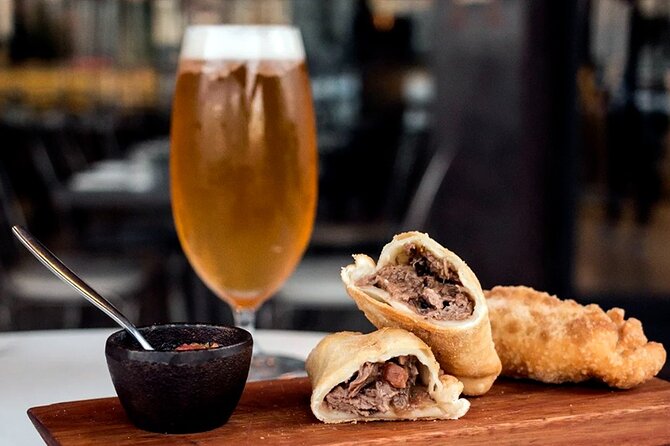 Traditional Argentine food tour in Buenos Aires - Vermouth and charcuterie in an art-lined passage, where the details matter